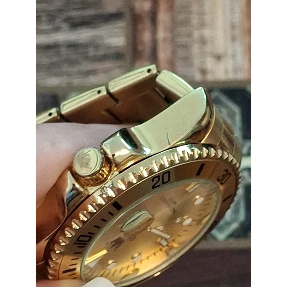 OLEVS 5885G 43mm Polished Goldtone Mens Watch,Day Indicator,Quartz Movement.